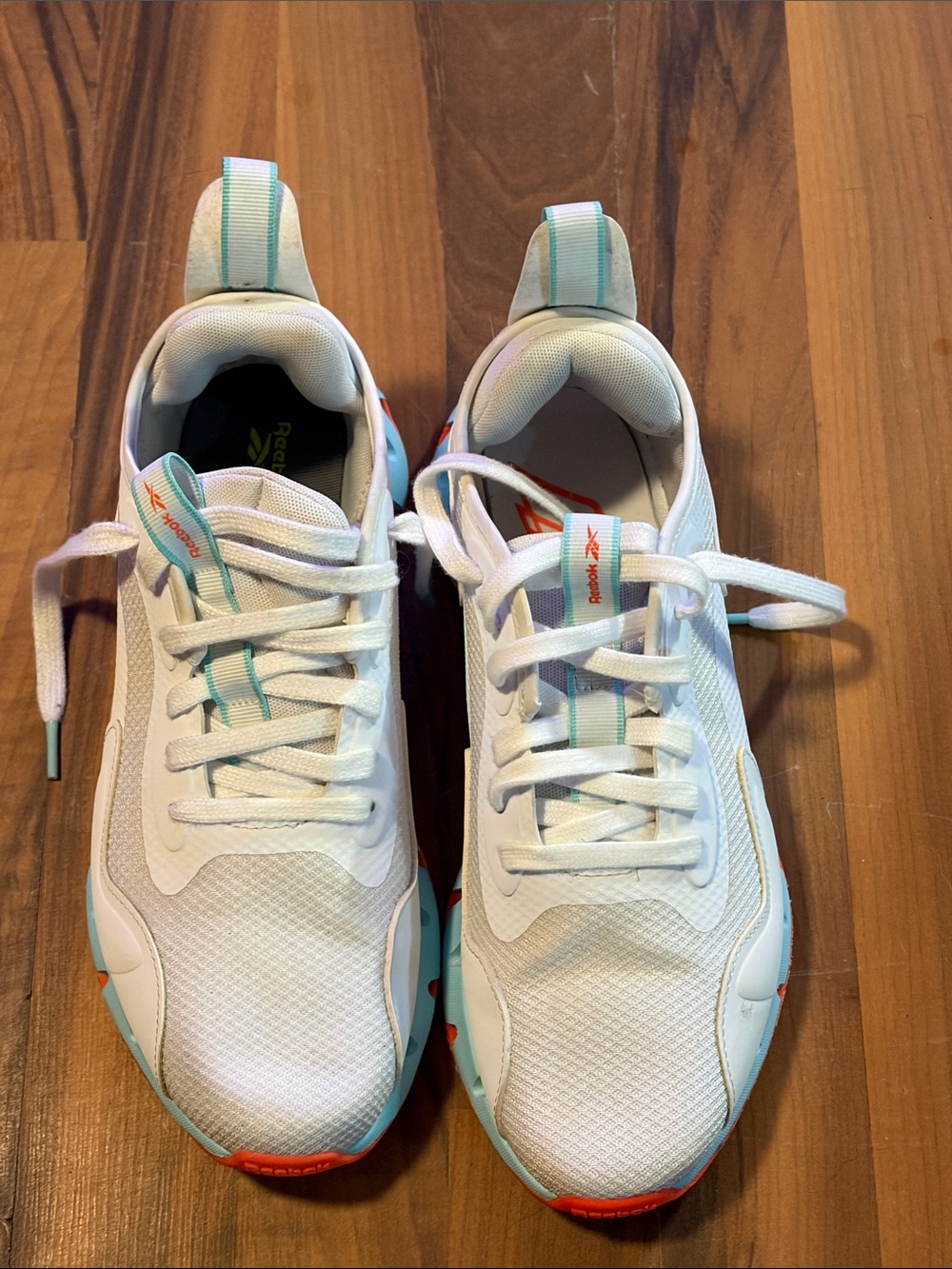 Reebok Kids White Sneakers with Teal and Orange Accents